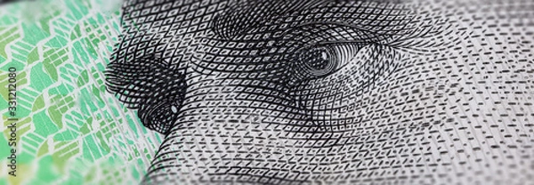 Obraz Macro Photography of the eyes of AB 'Banjo' Paterson on the 10 Dollar Australia banknote. Extreme close up to a Australian 10 dollars note. Polymer currency of the Reserve Bank of Australia