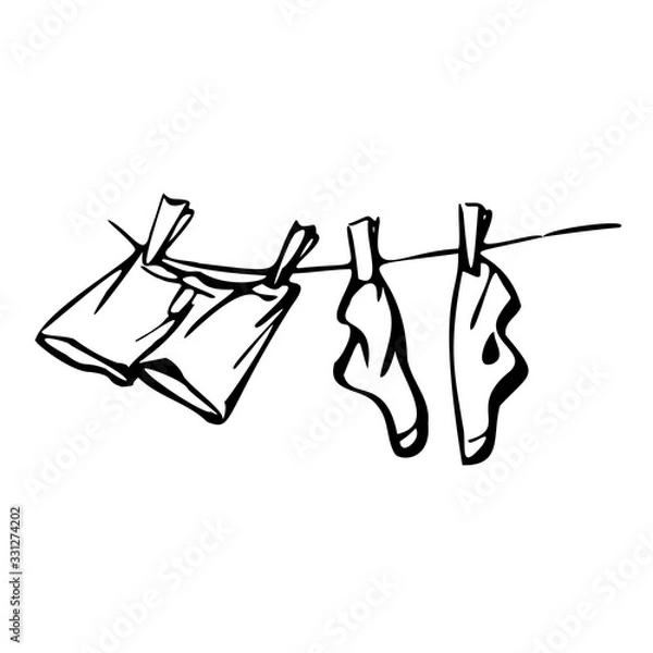 Fototapeta Socks and shorts are dried on a clothesline. Vector illustration in line art style. Isolated on a white background.