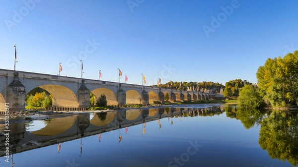 Obraz Beautiful view of the Wilson bridge and its reflection in the Loire river in Tours, France