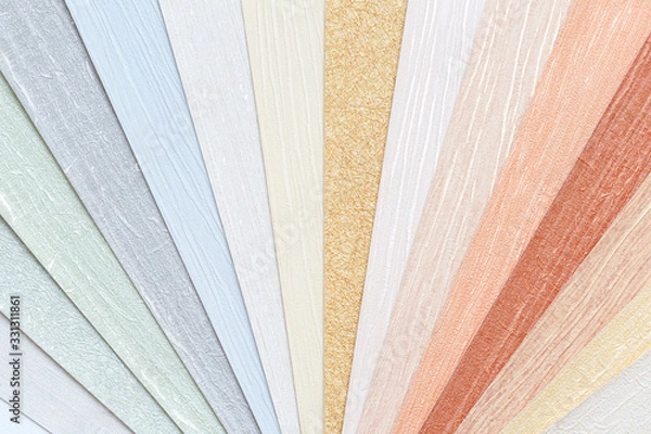 Fototapeta Samples for selecting the color of the interior walls. Book of Wallpaper samples for the designer's work