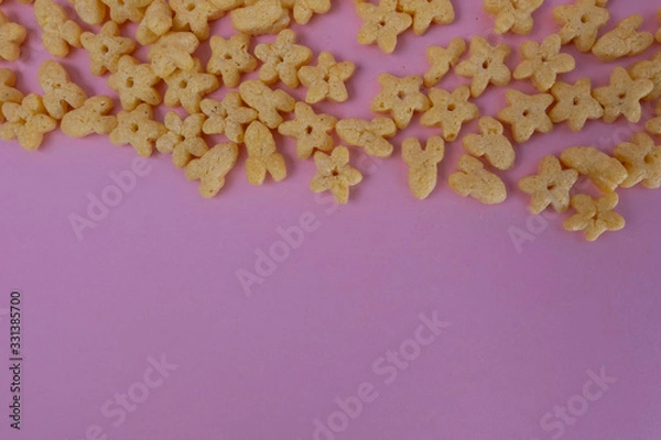 Obraz Breakfast cereal on a pink background. Top view, copy space.