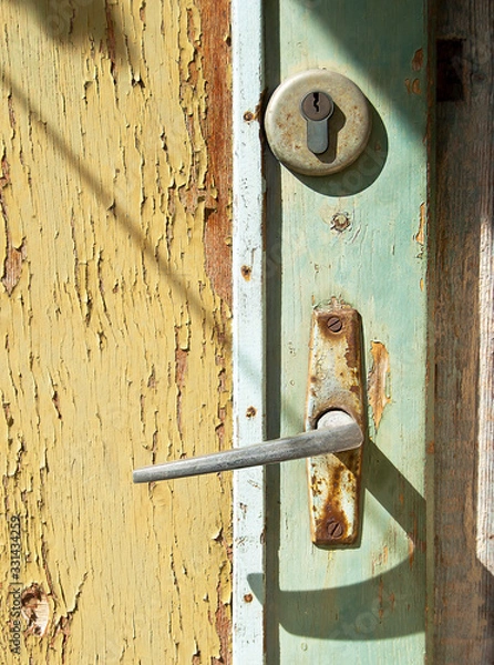 Fototapeta Door handle with additional lock.