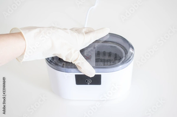 Fototapeta Cleaning systems for medical instruments. Ultrasonic cleaner on white background