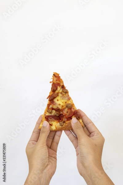 Fototapeta Slice of fresh  classic original Pizza held by hand