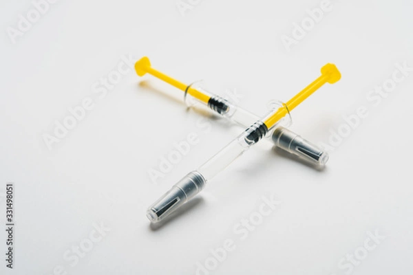 Fototapeta Coronavirus Vaccine, Corona virus Vaccine concept with syringe and.antidote on white background. Vaccine Concept of fight against coronavirus.