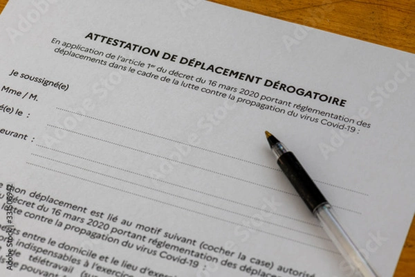Fototapeta Paris, France - March 19, 2020 : special certificate authorizing the movement of persons within the framework of the fight against the spread of the Covid-19 virus