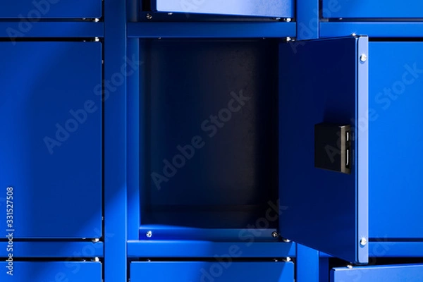Fototapeta Blue Safe Deposit Boxes With One Opened Locker. Safety Closets. 3d rendering.