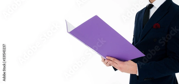 Fototapeta Caucasian adult businessman holding and reading document folder about term and condition contract or work information interview deal on paper from startup company isolated on white background