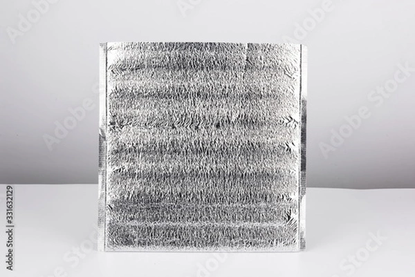 Fototapeta Silver white heat preservation bag, take out fresh-keeping moisture-proof bag in the isolated white background, domestic thermal bag