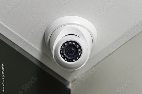 Fototapeta CCTV. Office portable surveillance camera. Control of ongoing events in the room.