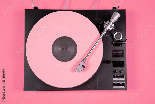 Fototapeta Colored vinyl record on a pink background with copy space.