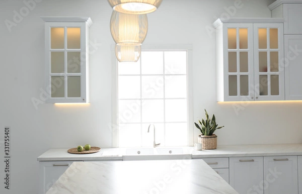 Fototapeta New ceramic sink and modern tap in stylish kitchen interior