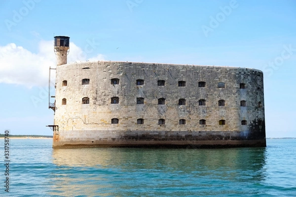Fototapeta Boyard is a fort of the French coast. View Fort Boyard at low tide, France.