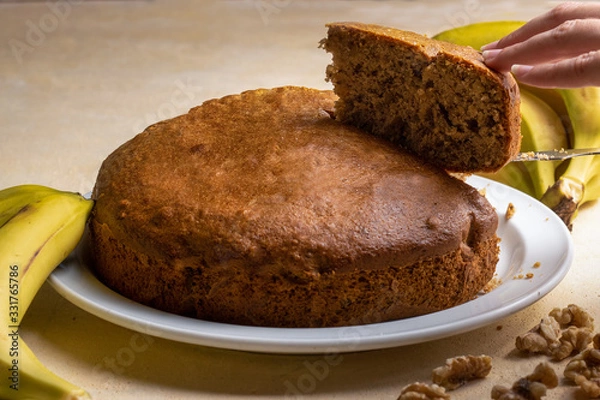 Obraz sponge cake with banana and walnuts