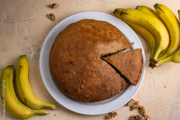 Obraz sponge cake with banana and walnuts