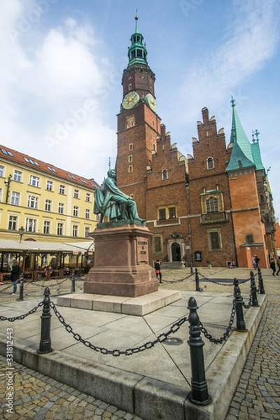Fototapeta The Market Square in the city center of Wrocław city in Poland. in the picture you see the old colorful buildings and the Old town hall building 