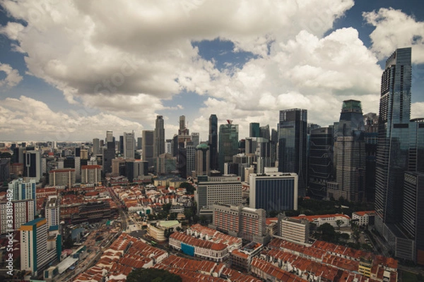 Fototapeta Singapore, an island city-state off southern Malaysia, is a global financial center with a tropical climate and multicultural population. with view of downtown skyscrapers