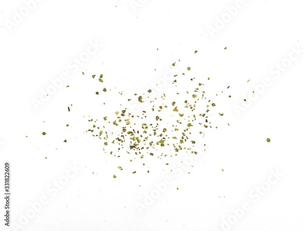 Fototapeta Pile of dried oregano isolated on white. Pile of dried oregano leaves on a white background. Spice for pizza. Pizza ingredient.