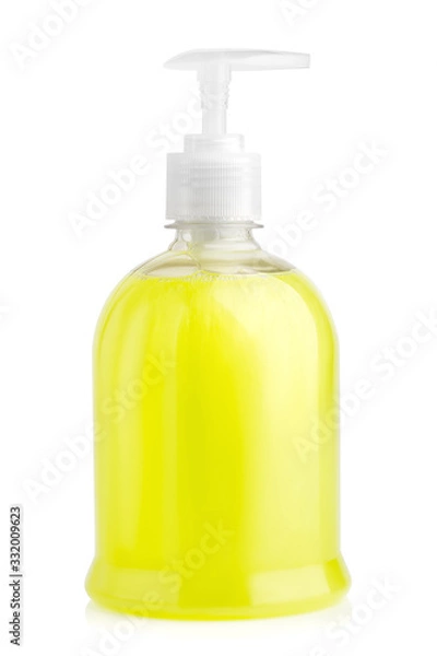 Obraz Yellow liquid soft soap in transparent bottle with pump isolated on white background. Cosmetic product for hygiene.