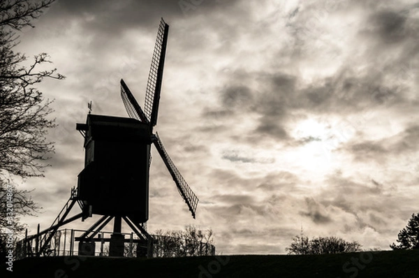 Obraz Windmill at backlight during sunset