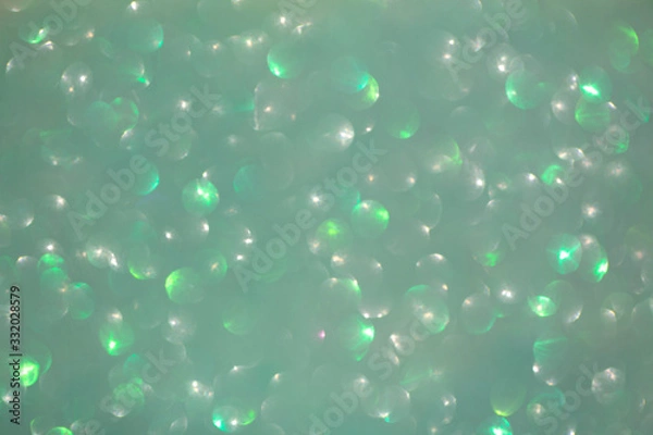 Fototapeta Soft focus, light bokeh on orange background.