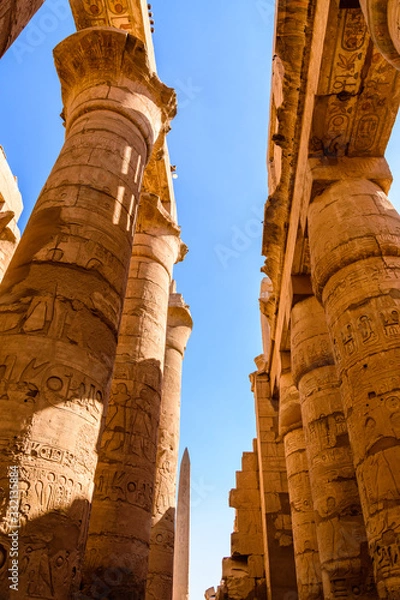 Fototapeta Columns in the great hypostyle hall of the Karnak temple. Looking up