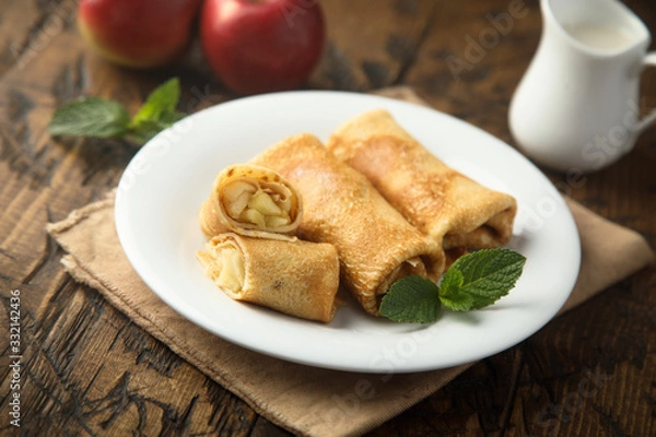 Obraz Crepes filled with apple and cinnamon