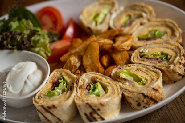 Obraz Omelette rolls on the table