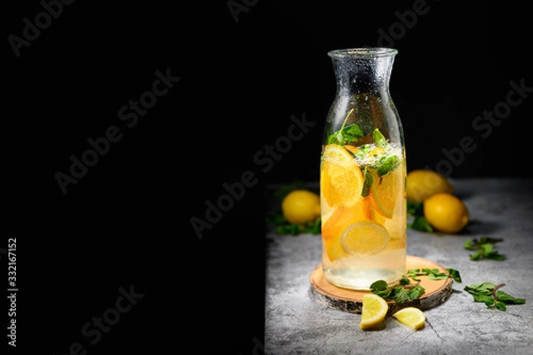 Obraz cool lemonade on a black background
