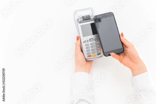 Fototapeta payment by smartphone through terminal at shopping