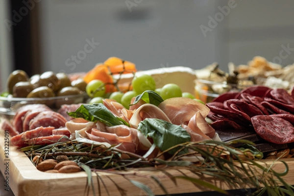 Obraz Closeup of Gourmet Charcuterie Board with Copy Space. Macro Selective Focus.