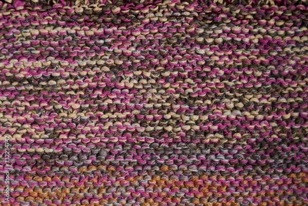 Fototapeta Multicolored knitted texture in macro using shawl technique
