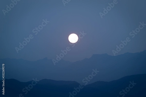 Fototapeta  DAWN BETWEEN MOUNTAIN RANGE