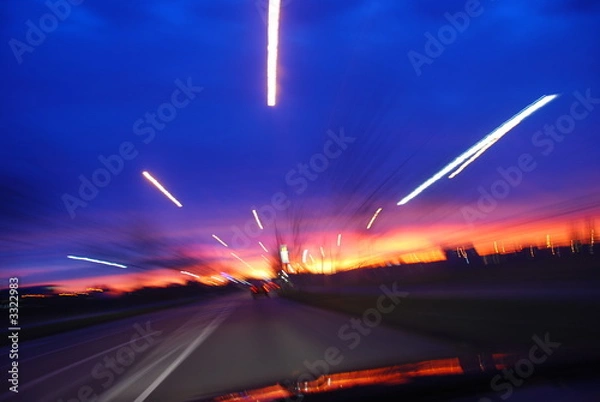 Fototapeta driving at sunrise with a beautiful sky