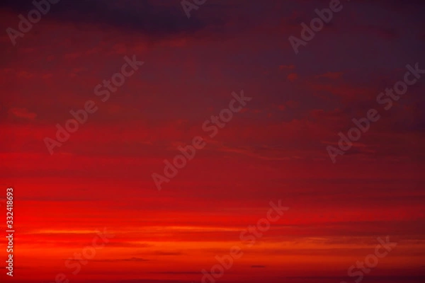 Fototapeta Beautiful Twilight sky background. Colorful Fiery orange and red sunset sky.