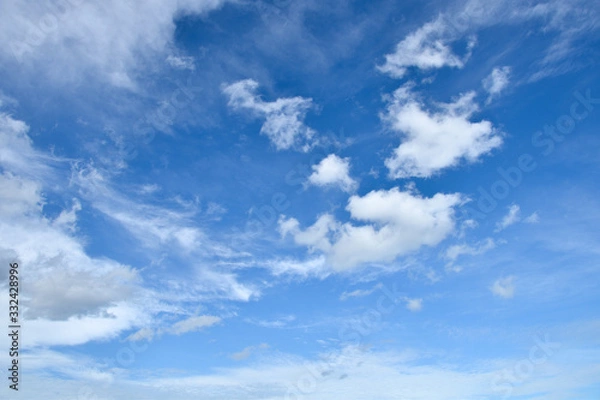 Obraz Partly cloudy in deep blue sky like a heaven.