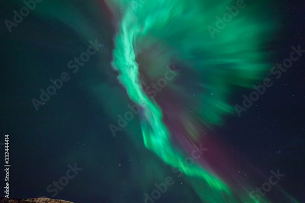 Fototapeta Northern lights - Aurora borealis looks like a angel with wings.