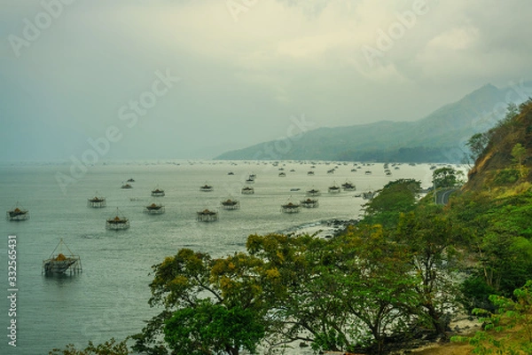 Obraz Thousands of fishing platforms lay one to another in the Indian ocean near Pelabuhan Ratu, West Java, Indonesia