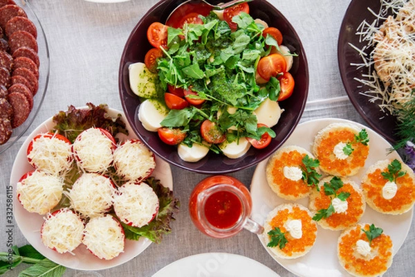 Fototapeta Restaurant dishes. Top view layout on the table