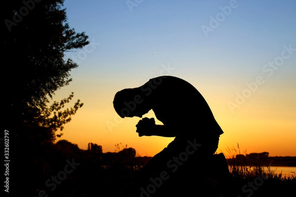 Obraz silhouette  man praying