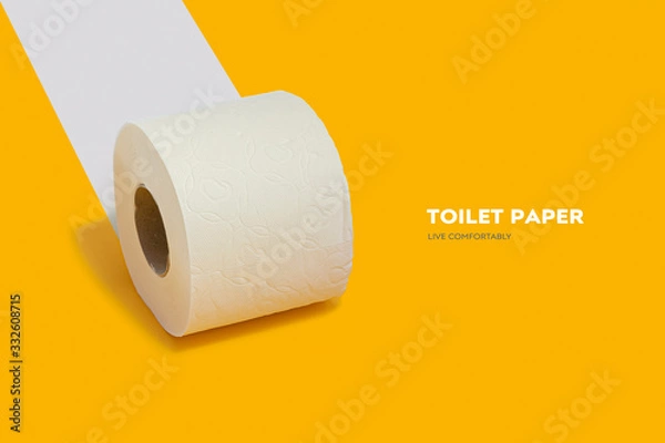 Obraz Rolka papieru toaletowego na żółtym tle do reklamy