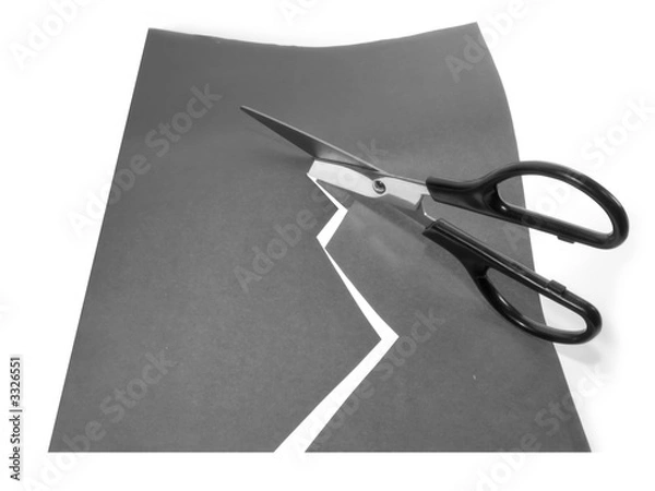 Obraz scissors cutting a paper