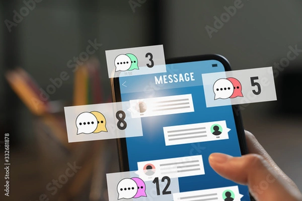 Fototapeta Hand holding smartphone and show screen new chat messages notification.