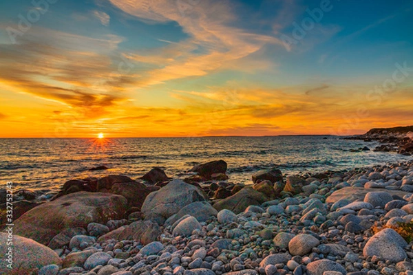Obraz Beautiful coastal sunset scene along the Atlantic Ocean at dusk.