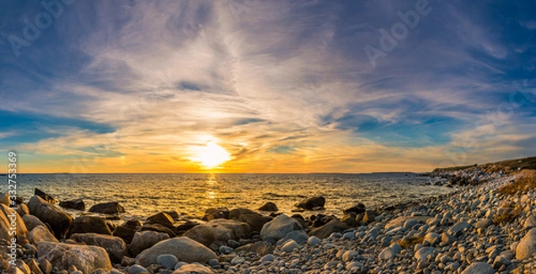 Obraz Beautiful coastal sunset scene along the Atlantic Ocean at dusk.