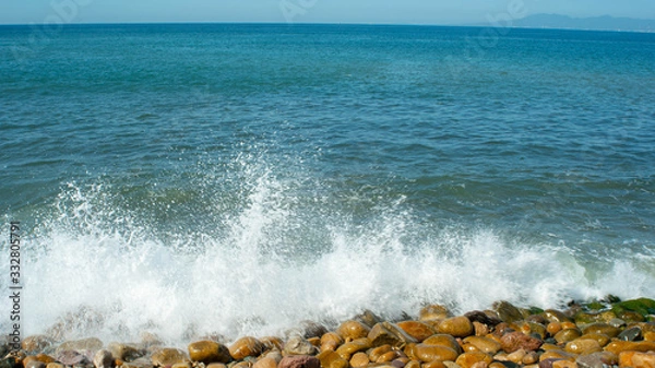 Obraz Bright Blue Ocean Crashing up Against Rocks