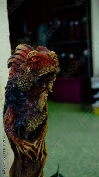 Obraz Wooden Sculpture of a Large Red Lizard In Mexico