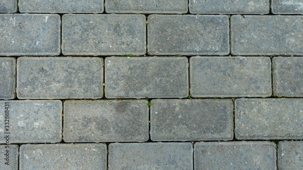 Fototapeta The texture of cement floor tiles. Rough surface with particles of sand and debris.