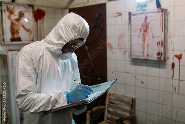 Obraz Scientist doctor biologist in protective suit writing vaccine experimental report in the laboratory making resarch of Coronavirus COVID-19 so safe humanity