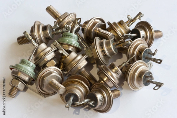 Fototapeta Old thyristors on a white background.